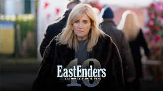 Cindy, armed with a gun and the truth, ready to take on attacker in EastEnders.