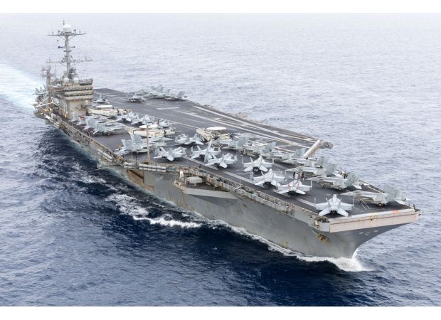 US Navy's nuclear aircraft carrier collides with ship in Suez Canal.