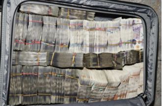 A passenger at Heathrow Airport was arrested for having £400,000 in cash in their luggage.
