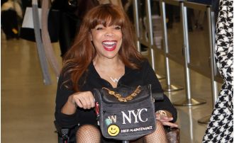 A 60-year-old celebrity uses a mobility scooter in a rare public appearance.