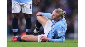 Guardiola downplays fears of Haaland injury after possible ACL scare.