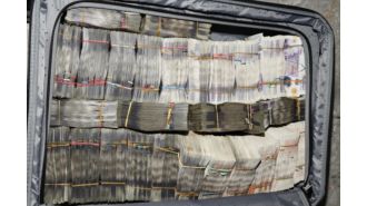 A passenger at Heathrow Airport was arrested for having £400,000 in cash in their luggage.
