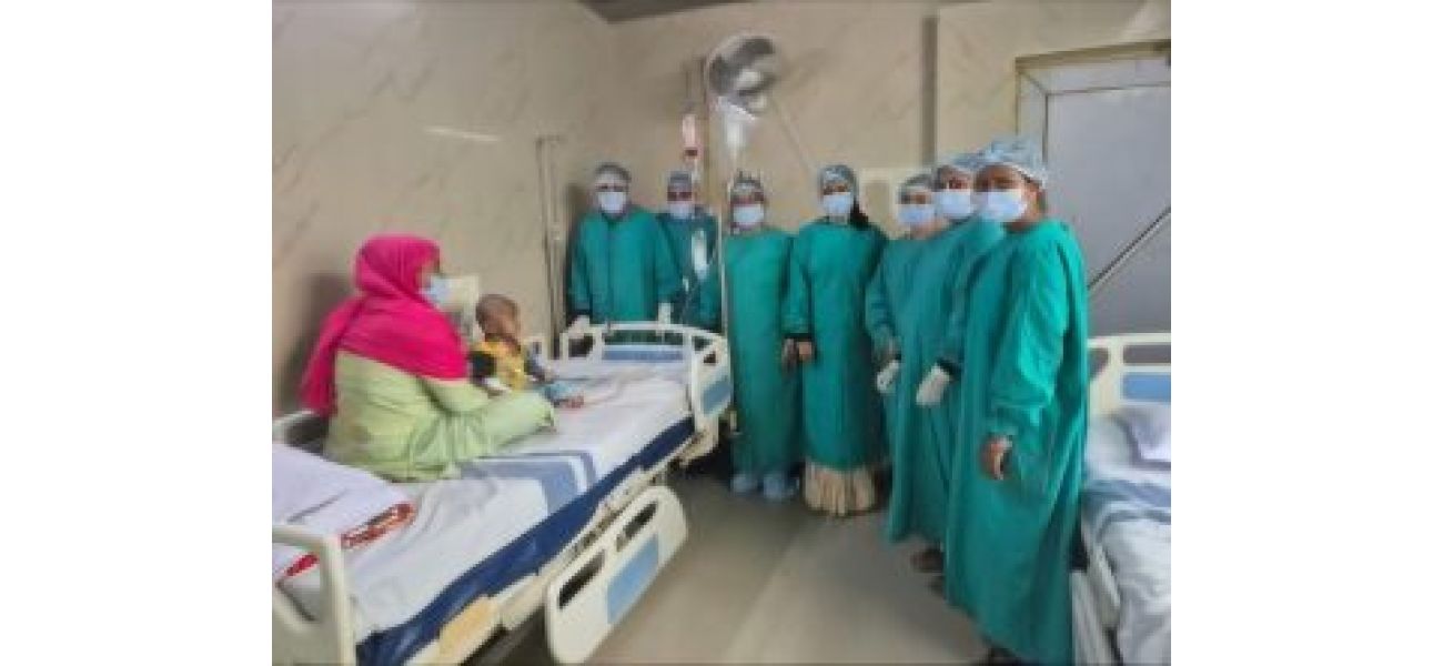 A young girl, age 4, gives stem cells to her sister.