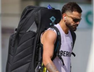 Cricket star Kohli prepares for Pakistan match by practicing spin skills.