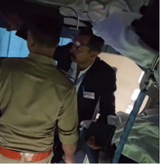 A police officer is caught by a train inspector in a viral video. Watch it now.