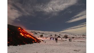 Adventurous travelers ignore Italy's warning and ski on an active volcano.