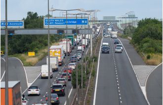 Body found on road shuts down two busy highways