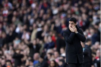 Gary Neville criticizes Arsenal's fixation on Liverpool after they increase their lead at the top.