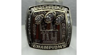 Former NFL player Plaxico Burress' Super Bowl ring sold for a record-breaking $280K.