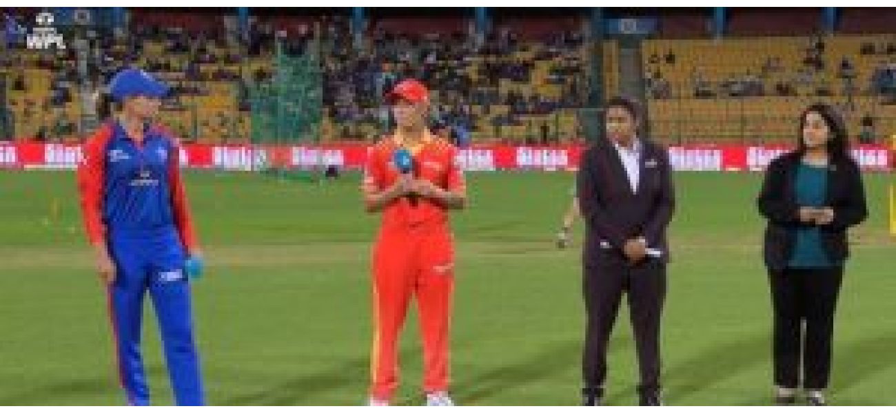 Delhi Capitals choose to bowl first against Gujarat Giants in a WPL match.