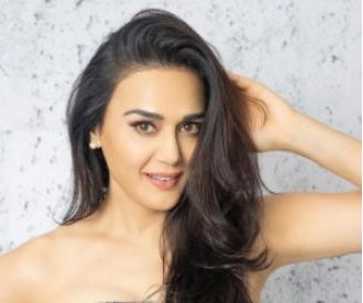Actress Preity Zinta clarifies rumors about her bank loan being waived off, confirming that it is not true.