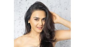 Actress Preity Zinta clarifies rumors about her bank loan being waived off, confirming that it is not true.