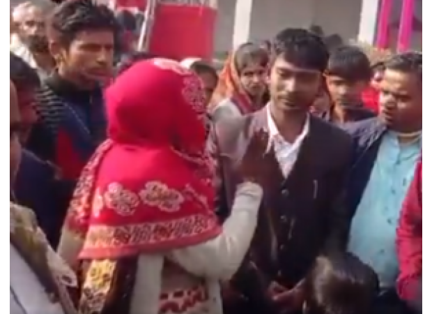 A drunken groom mistakenly garlands the wrong woman, causing a wedding to turn into a WWE-style fight.