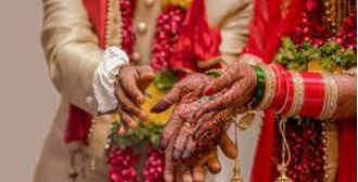 Couple gets married in hospital, leaving wedding attendees emotional.