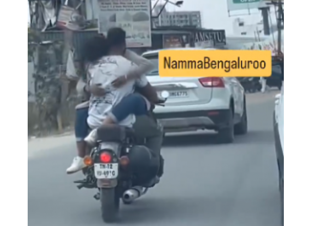 Watch a video of a couple's adventurous bike ride, featuring 'Kabir Singh' from Meesho, that has gone viral.