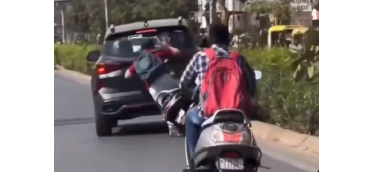 Viral video shows scooter crash in Gujarat due to car driver's reckless right turn!
