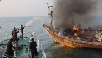 Coast guard rescues 18 fishermen from burning boat near Raigad.