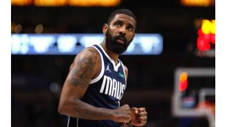 Kyrie Irving visits Kobe and Gianna Bryant's statues and is overcome with emotion.