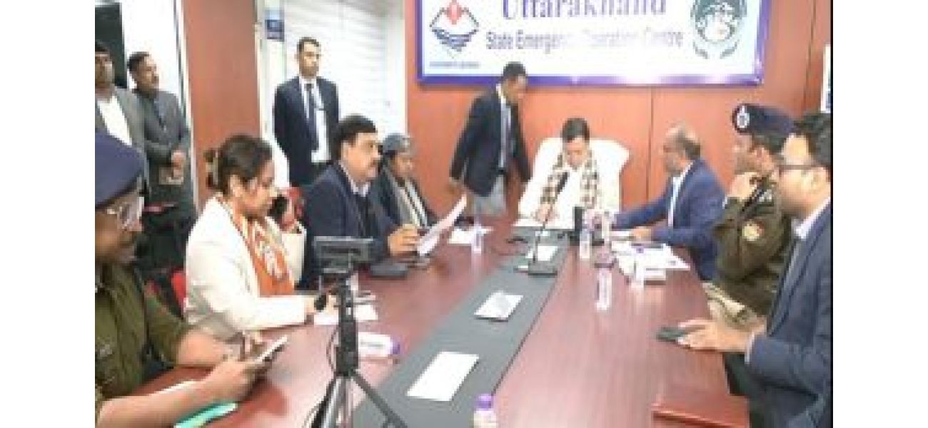 Dhami inspects disaster control room during Uttarakhand avalanche emergency.