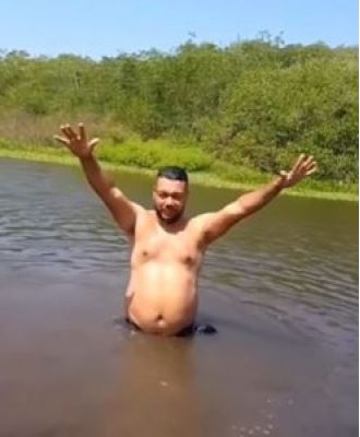 A man takes a refreshing dip in a river, but what he finds under the water will shock you.