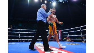 A boxer blames the referee for destroying his hopes after being disqualified in a dramatic turn of events.