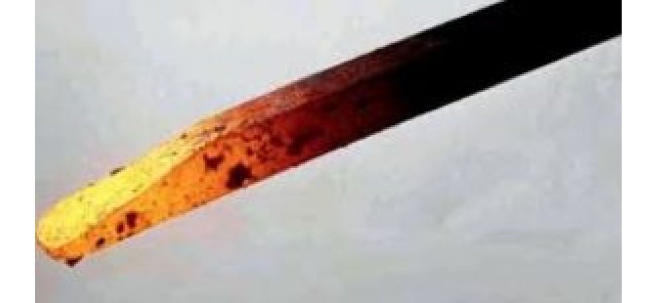 An infant was marked with a hot iron rod 40 times.