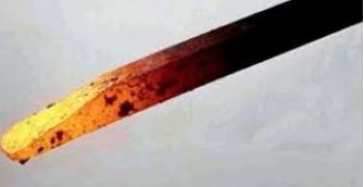 An infant was marked with a hot iron rod 40 times.