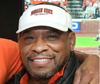Morgan State's wrestling program is improving thanks to the leadership of Olympic champion Kenny Monday.