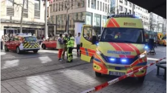 Car slams into group in western Germany, killing 1 and injuring many