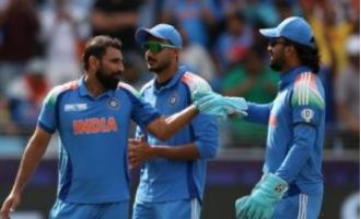 India restrict Australia to 264/10 in semifinal with impressive half-centuries from Smith and Carey.