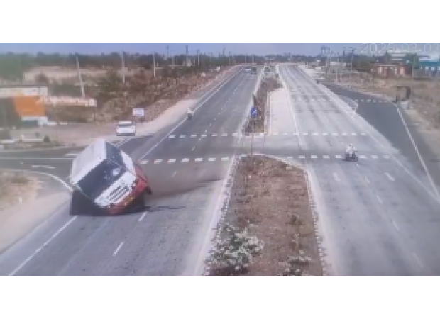 Biker's dangerous actions cause bus to overturn, then leaves without any concern.