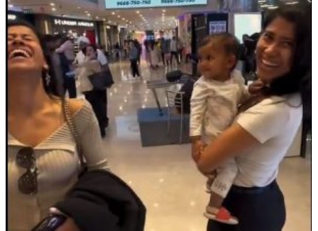 A toddler mistakes his mother's twin for his actual mother during their first encounter, captured in a heartwarming viral video.