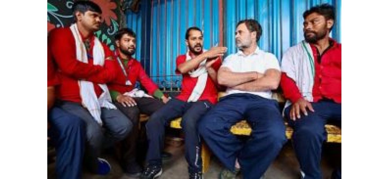 Rahul Gandhi talks to NDLS workers, pledges to support them.