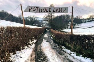 Local governments must repair potholes or risk losing funding for road maintenance.
