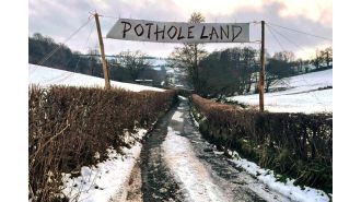 Local governments must repair potholes or risk losing funding for road maintenance.