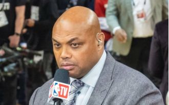 NBA star Charles Barkley is teased during a game of Pop The Balloon in San Antonio.