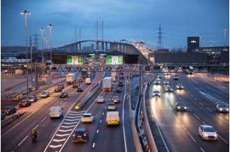 Traffic delays at Dartford Crossing due to lorry blocking lanes near M25 for an hour.
