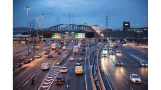 Traffic delays at Dartford Crossing due to lorry blocking lanes near M25 for an hour.