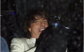 Tom Cruise kept Ana de Armas out of sight as they left David Beckham's 50th birthday party.