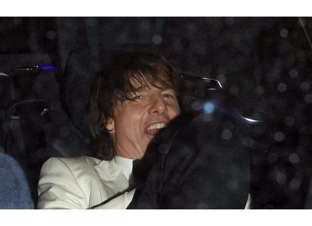 Tom Cruise kept Ana de Armas out of sight as they left David Beckham's 50th birthday party.