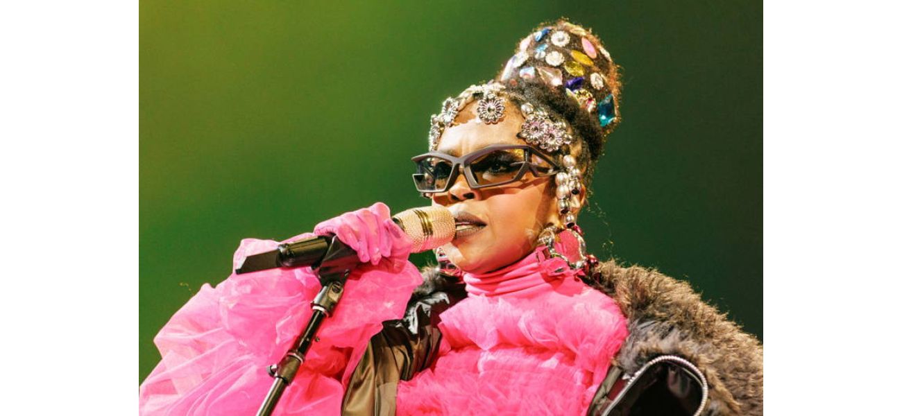 Singer Lauryn Hill stresses the significance of community in songwriting during her visit to Harvard.