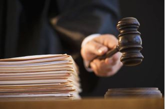 A black woman was promoted in the Akron Fire Department, but a white captain who was not selected is now suing for discrimination.