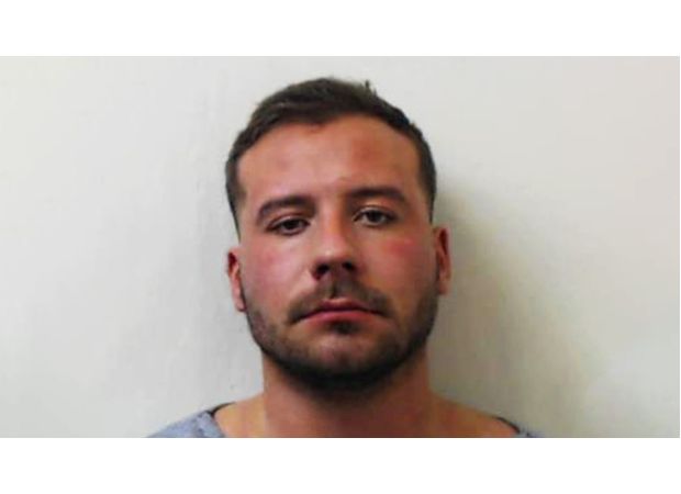 A man killed his 21-year-old girlfriend, cut off her head, and posed as her afterwards.