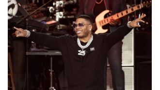 Nelly still denies support for Trump, claims performance doesn't equal endorsement.