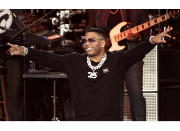Nelly still denies support for Trump, claims performance doesn't equal endorsement.