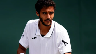 Tennis player honors late Diogo Jota with black ribbon at Wimbledon.