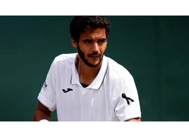 Tennis player honors late Diogo Jota with black ribbon at Wimbledon.
