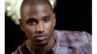 Singer Trey Songz accused of attacking hired cameraman at event, currently under investigation.