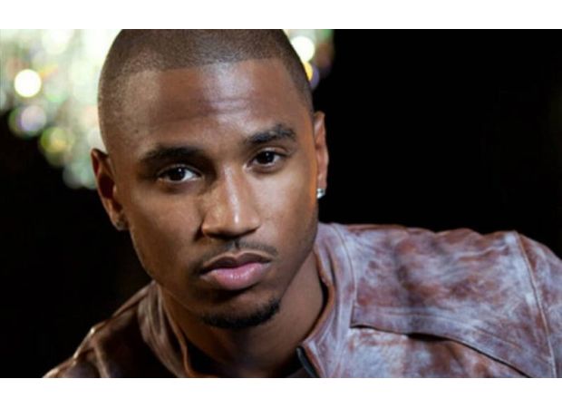 Singer Trey Songz accused of attacking hired cameraman at event, currently under investigation.