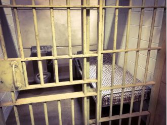 A report found that 'pay to stay' prison debt disproportionately affects black women, creating a heavier burden for them.